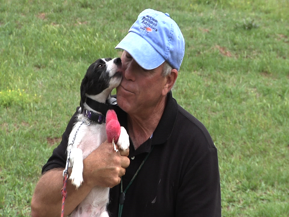 Kissing dog